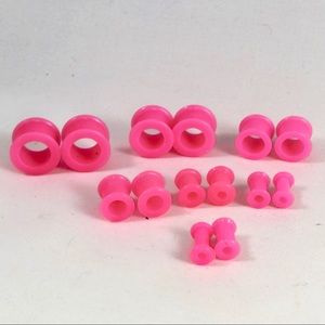 Pair of Double Flare Pink Silicon Ear Tunnels